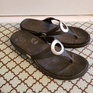 Crocs flip flops in black